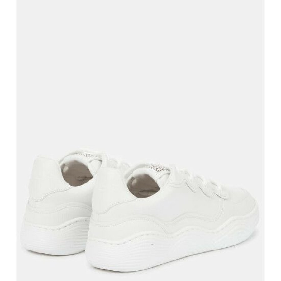 * Alaia Laser-Cut Leather Sneakers